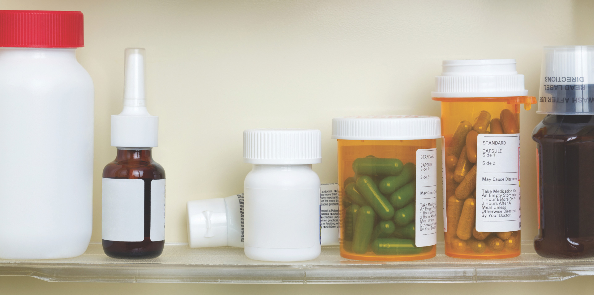 medicine containers in medicine cabinet