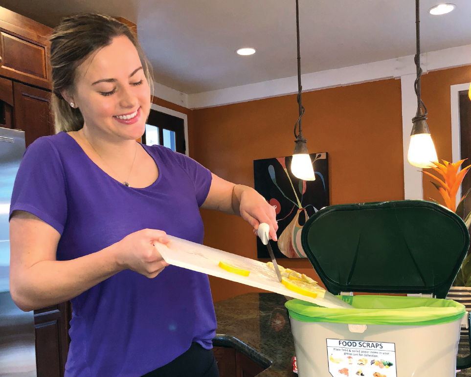 Woman recycling food scraps