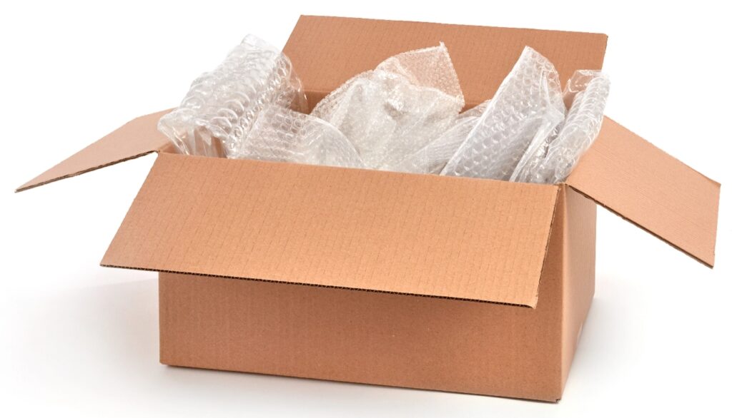 Open cardboard box with bubble wrap inside